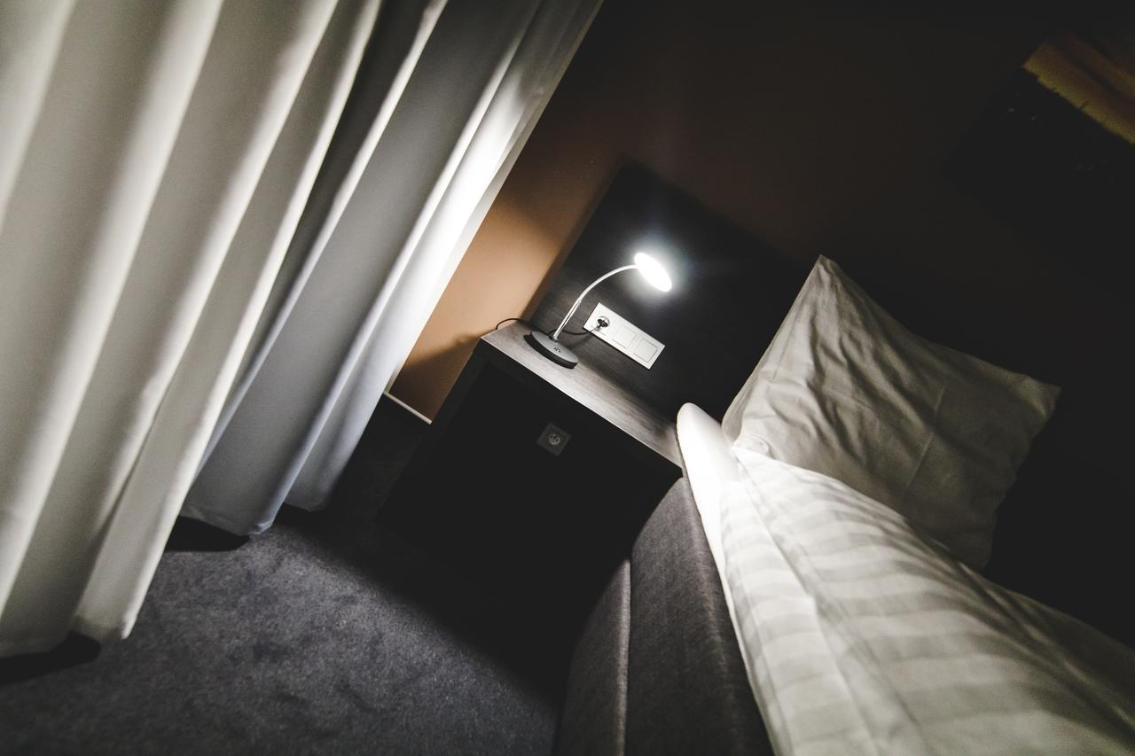 Silesia Residence Ostrava Eksteriør bilde A bedside table